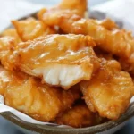 Crispy golden chicken served with sides