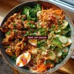 Delicious Bang Bang Chicken Bowl with spicy sauce and fresh veggies