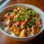 Delicious Bang Bang Chicken Bowl featuring spicy chicken and fresh veggies