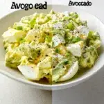 Creamy avocado and egg salad in a bowl garnished with herbs