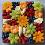 A beautifully arranged Easter fruit tray with an assortment of fresh fruits