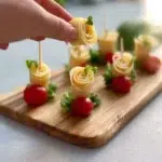 Emmental & Prosciutto Flower Bites Recipe for Easy Entertaining 12 emmental prosciutto flower bites 2026 05 08 135105 1