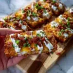 Crispy loaded hashbrowns patties topped with cheese and green onions
