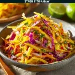 Fresh Mango Slaw with colorful vegetables and dressing