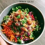 Delicious Asian Chicken Crunch Salad with fresh vegetables and crunchy toppings