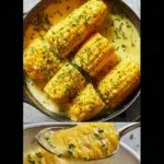 Delicious buttery boiled corn on the cob served on a plate.