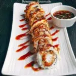 Dynamite Roll sushi with spicy sauce and fresh ingredients