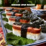 Delicious Hawaiian Spam Musubi with Spam, rice, and nori wrapped together.