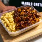 Delicious Honey Garlic Butter Chicken served with creamy Mac and Cheese