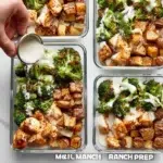 Healthy chicken meal prep with garlic herb chicken, roasted potatoes, and broccoli.